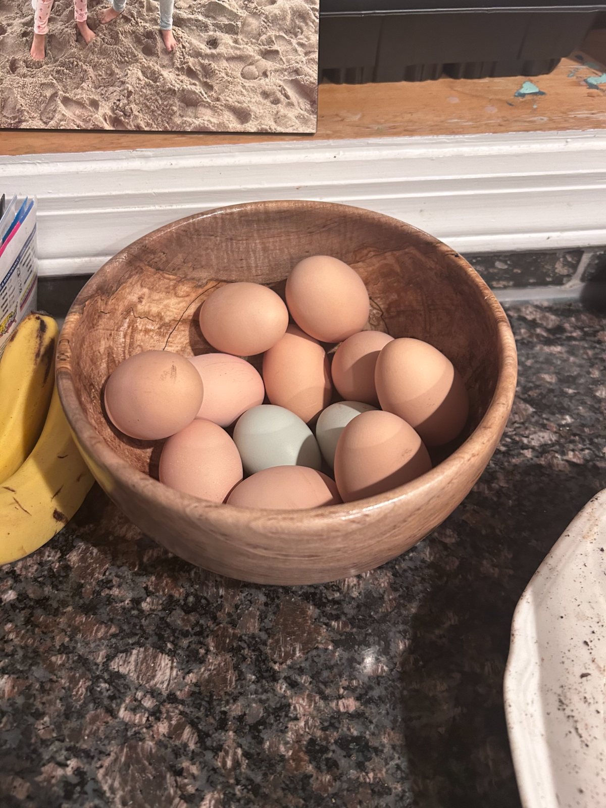 Figured deep bowl. The figured deep bowl holding eggs on a kitchen counter.