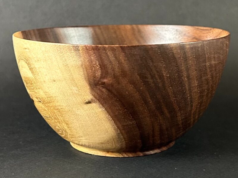 Deep contrast bowl. Deep bowl with contrasting pale and dark brown sections.
